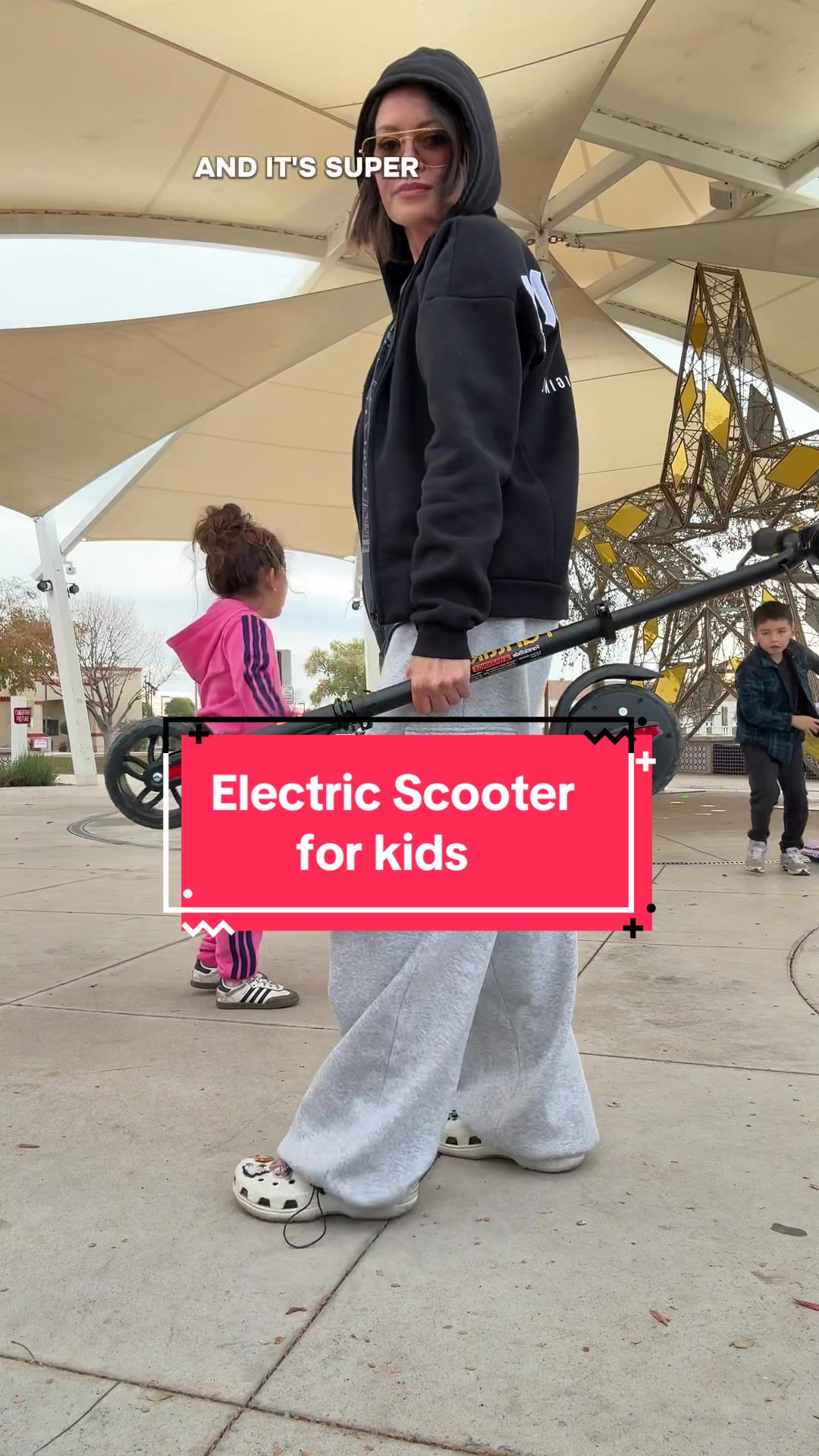 TikTok post by @mariawiles1 for Fanttik. Caption reads: [...] #escooter #electricscooter #toysforkids....