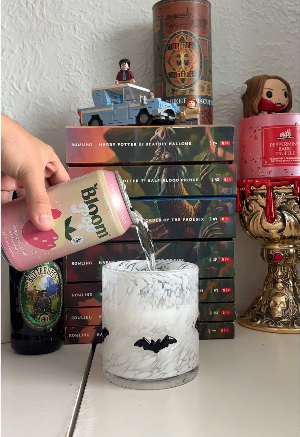 TikTok post by @liyahlestrange for Bloom Nutrition. Caption reads: [...] #halloweenszn #spookyszn @Bloom Nutrition.