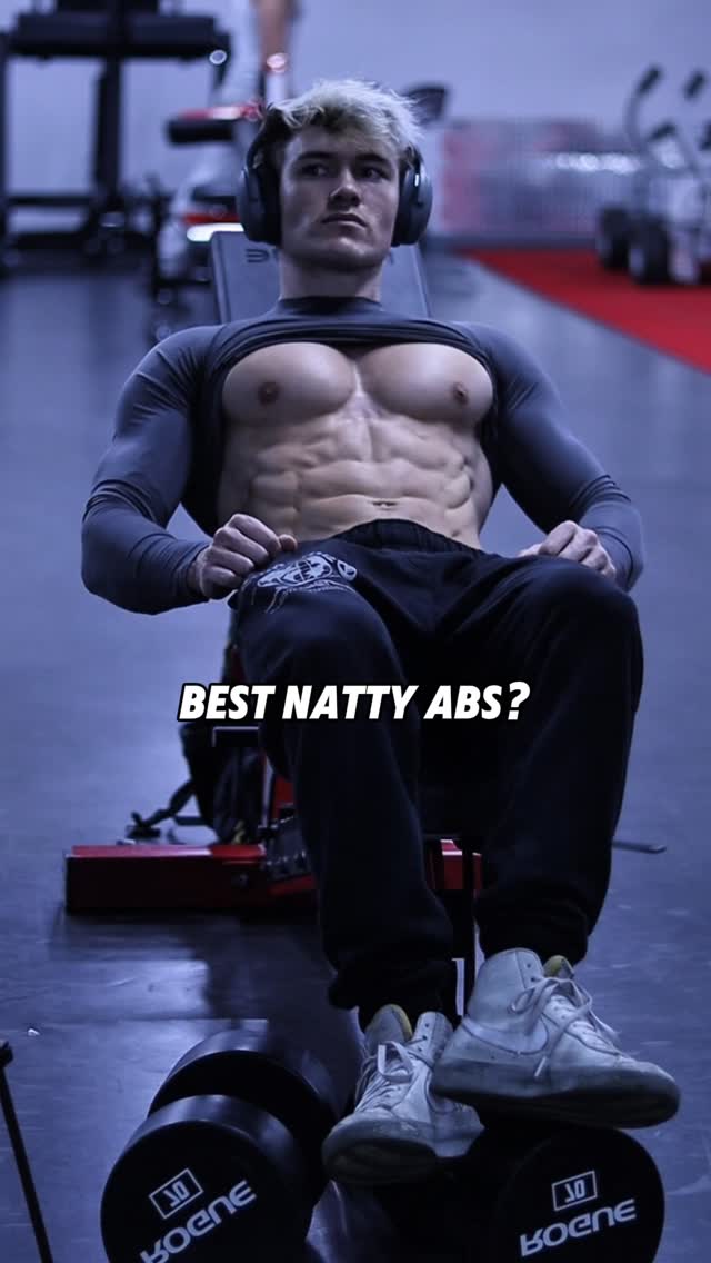 Instagram post by @bjarnson_fitness for Gymshark. Caption reads: Name someone with better year-round abs....