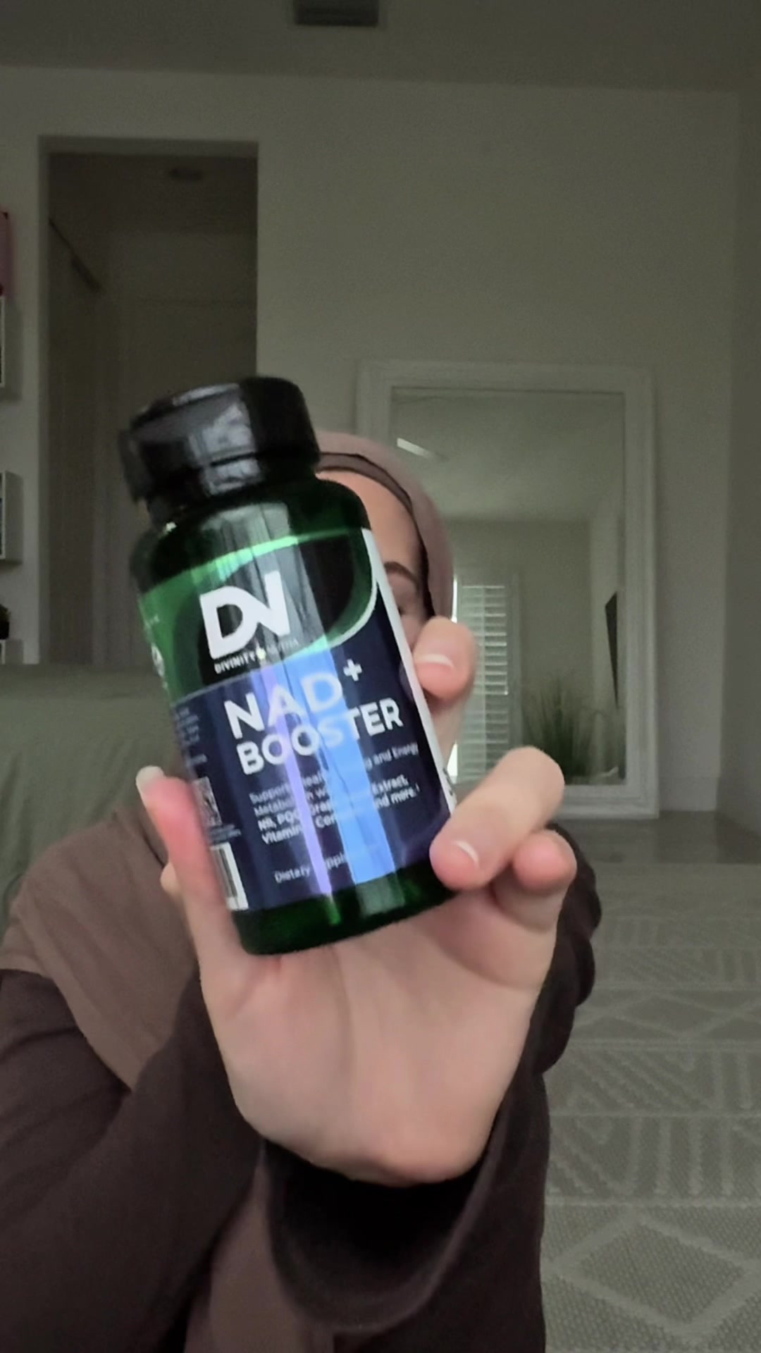 TikTok post by @ayah.kanaa for Divinity Nutra. Caption reads: NAD BOOSTERS 💊⚡️⚛️ w/ @divinitynutra.usa....