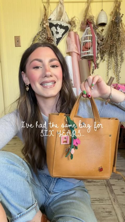 Instagram post by @grace_coats for Portland Leather Goods. Caption reads: I’ve had this bag for almost seven YEARS 😳🤯 I....