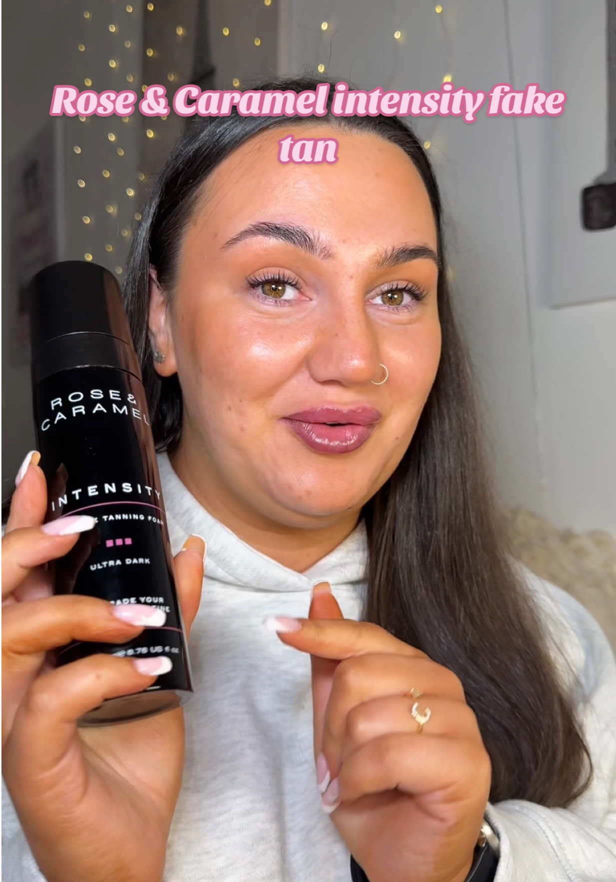 TikTok post by @caitlin_sinnett for Rose & Caramel. Caption reads: [...] most flawless tan!! 🖤 @Rose & Caramel....