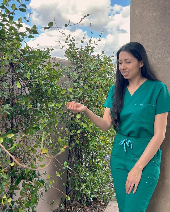 Instagram post by @nurselinda_us for DOLAN Scrubs. Caption reads: [...] yarn, antimicrobial, lightweight....