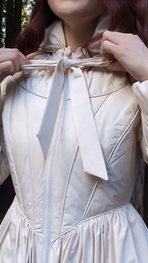 Instagram post by @thescarletthuntress for Lacemade. Caption reads: Truly in love with this coat from....