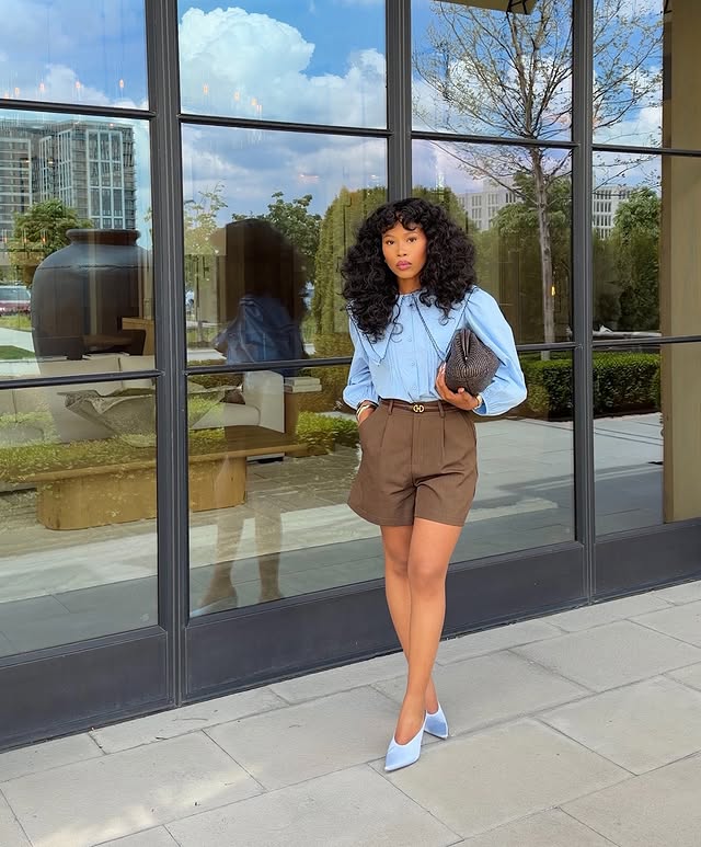 Instagram post by @lwethu_mcusi for JustFab. Caption reads: caught the blues 🌀 Shoes | @justfabonline Hair |....