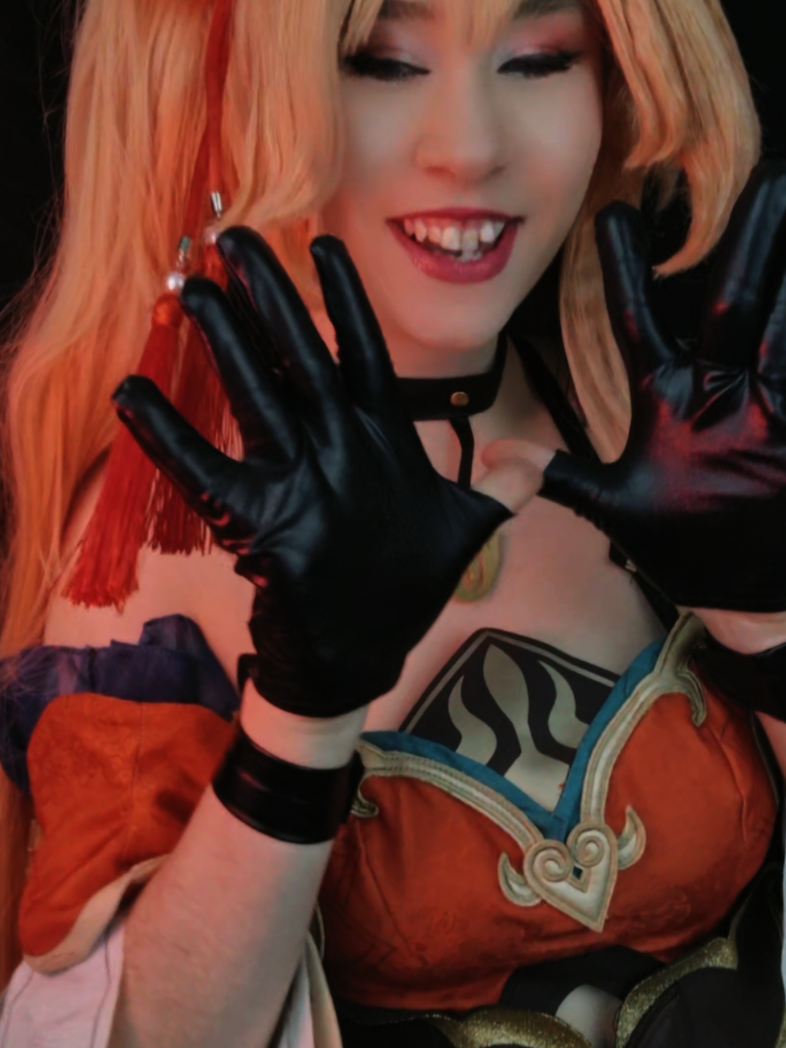 TikTok post by @violet..requiem for Uwowo Cosplay. Caption reads: [...] 💕 Cosplay: Uwowo Guinaifen @Uwowo Cosplay....