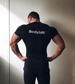 Instagram post by @augustkolberg for Bodylab. Caption reads: Got some sick clothing from @bodylabnorge 💪🏽 #ad.