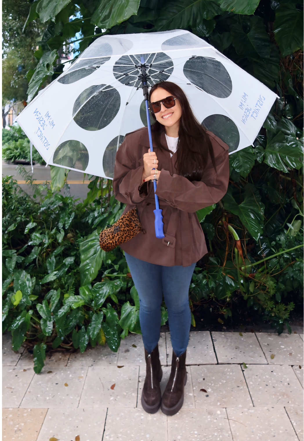 TikTok post by @danidecespedes for Meshki. Caption reads: smiling in the rain ☔️ @Meshki #casualstyle....