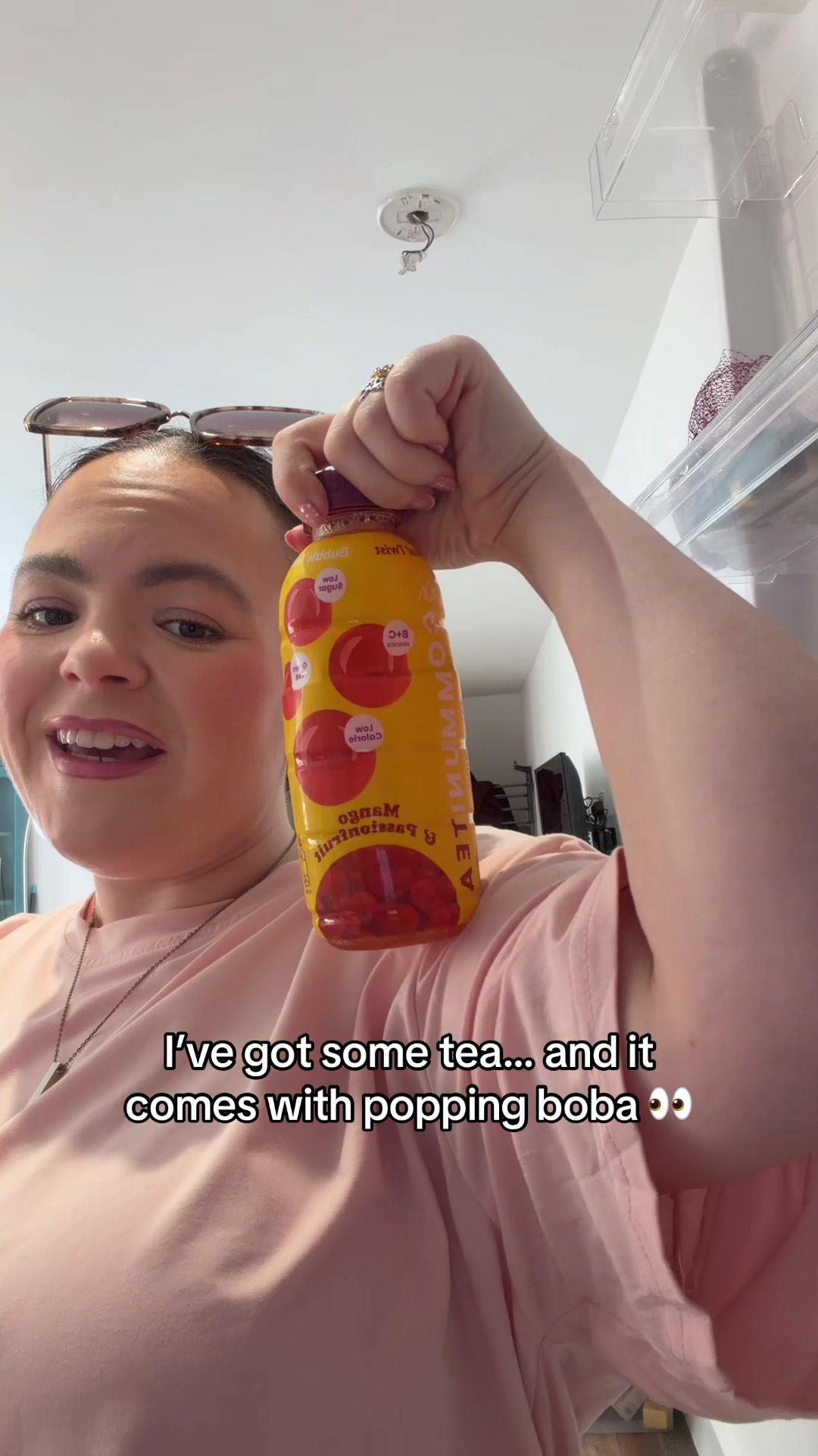 TikTok post by @meggoldberger for Tempo Tea Bar. Caption reads: [...] some tea… and it literally pops 👀🧋 @Tempo....