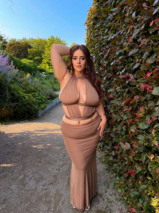 Instagram post by @oliviasworld95 for Fashion Nova Curve. Caption reads: @FashionNovaCurve • big goddess energy 🐍✨ #ad....