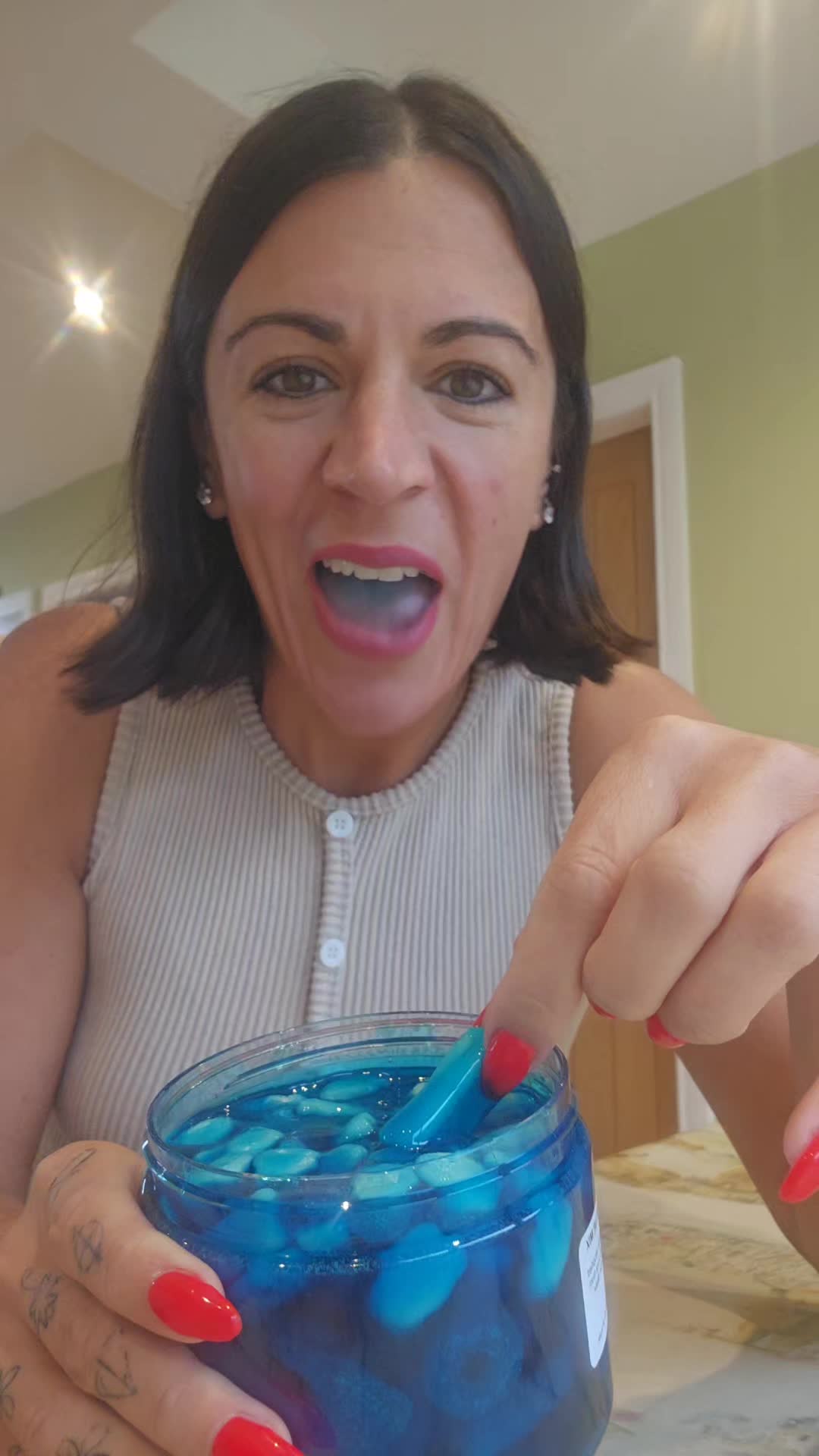 TikTok post by @francescaadhdmumsenkids for ChamoyGuysUK. Caption reads: @ChamoyGuysUK #blue #sour #gooey #sweets #treat.