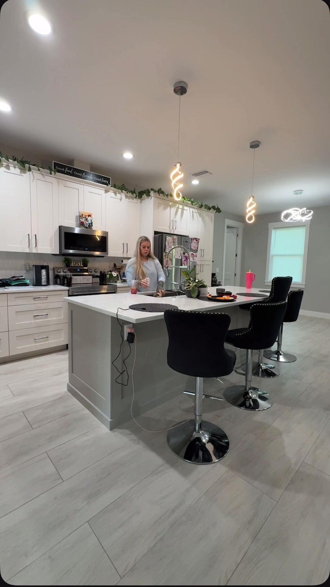 TikTok post by @itsmamacookie for Aeroflow Urology. Caption reads: This video is complete chaos lol but let’s get....