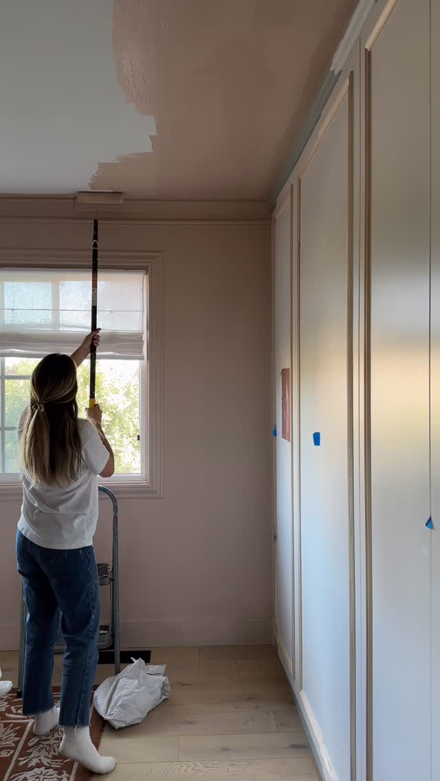 Instagram post by @rebeccaandgenevieve for Benjamin Moore. Caption reads: Next up, painting our closets a shade of red ♥️....