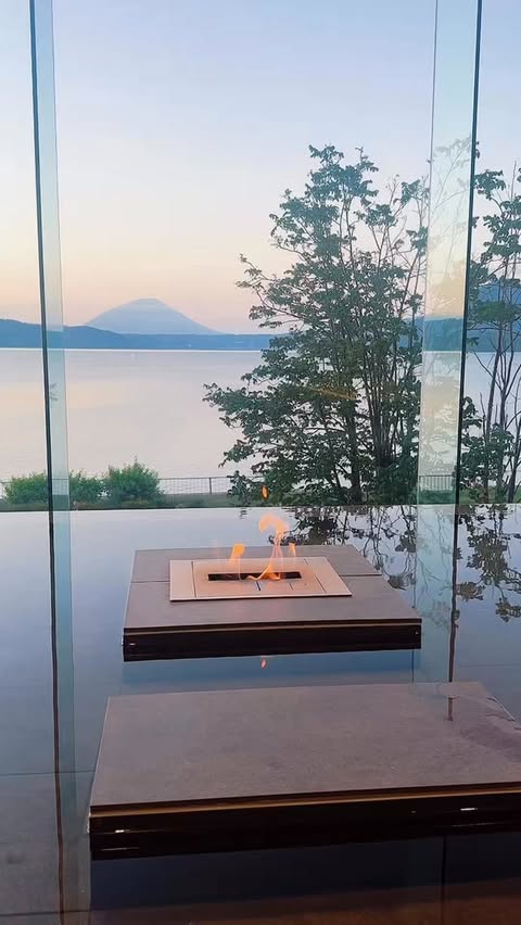 Instagram post by @theluxuryasia for Singapore Travel Specialist by Dirgantara Fasa. Caption reads: I almost skipped staying at Lake Toya, Hokkaido…....