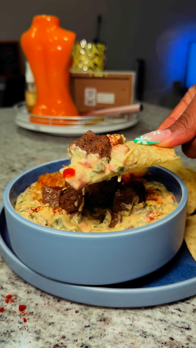 Instagram post by @missmo2323 for Doritos. Caption reads: Surf and Turf Spinach Rotel Dip 

Comment MEATS....