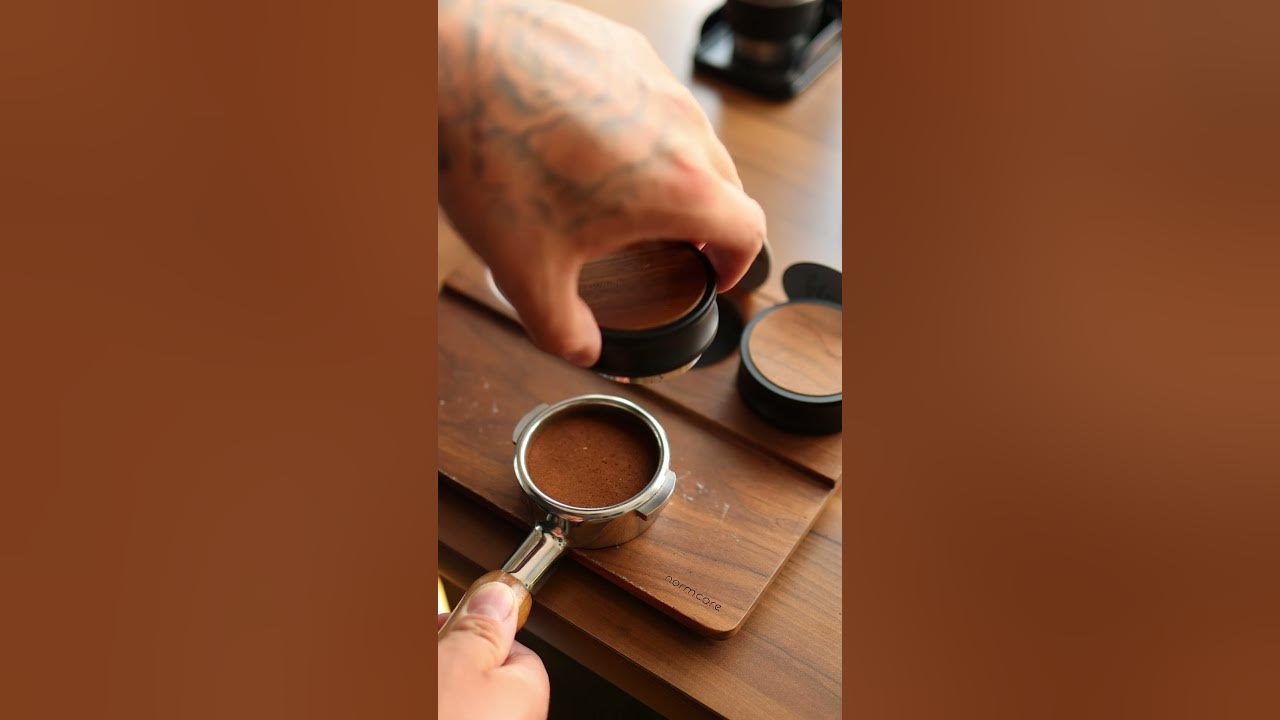 YouTube post by @FlairEspresso for Flair Espresso. Caption reads: FLAIR X NORMCORE.