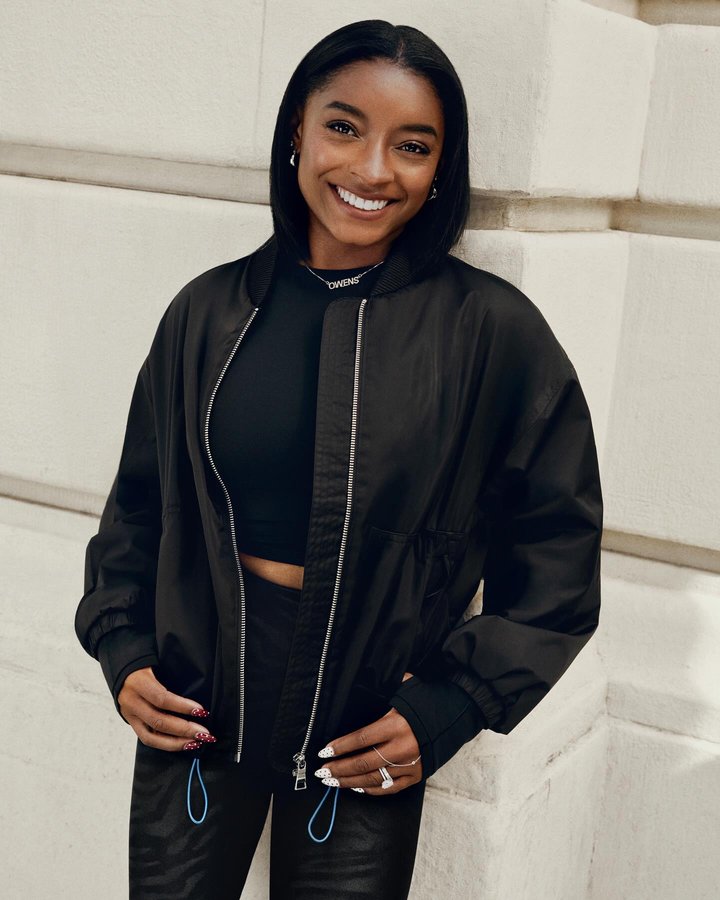 Instagram post by @simonebiles for Athleta. Caption reads: I’m beyond excited to share my newest @athleta....