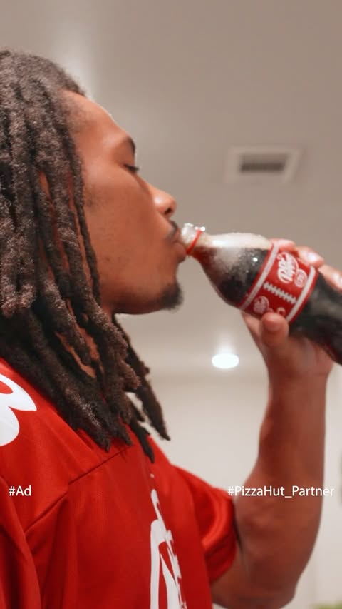 Instagram post by @ashto_world8 for Pizza Hut. Caption reads: #ad The perfect game day pairing? @pizzahut and....