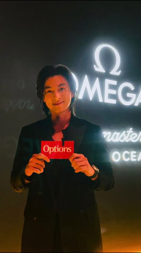 Instagram post by @optionstheedge for OMEGA. Caption reads: [...] versatile and undeniably charismatic,....