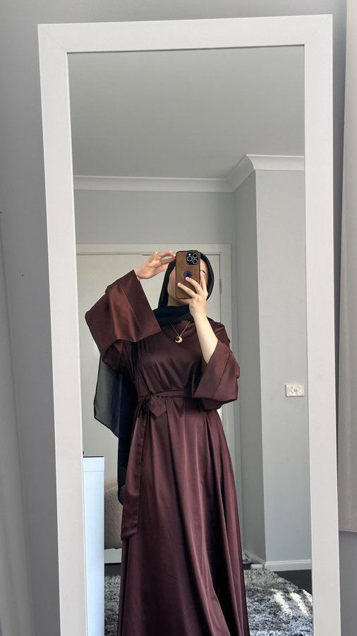 Instagram post by @thisissaeeda for Fajr Noor. Caption reads: Beautiful abaya and necklace from @fajrnoor.au....