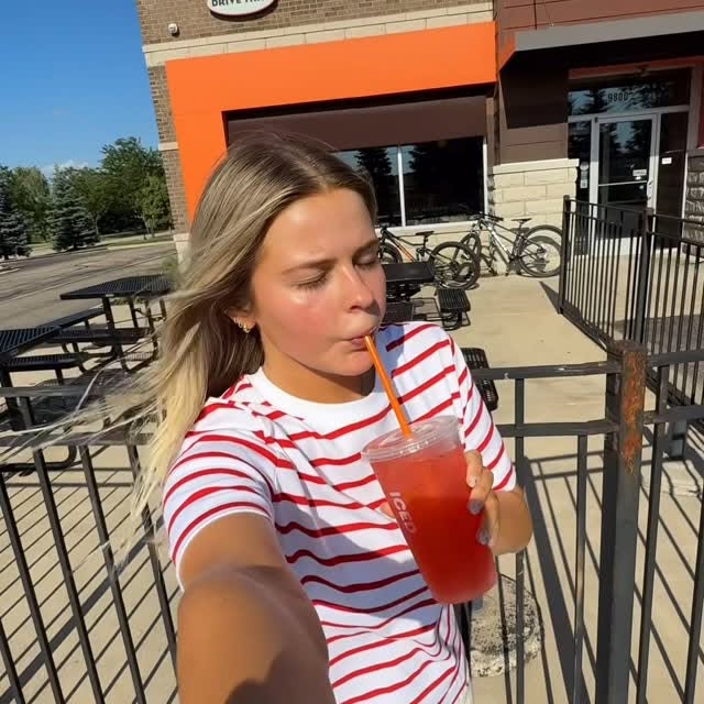 Instagram post by @darcymcqueeny for Dunkin’. Caption reads: your summer runs on Dunkin’!😙🍓🌞🍊....
