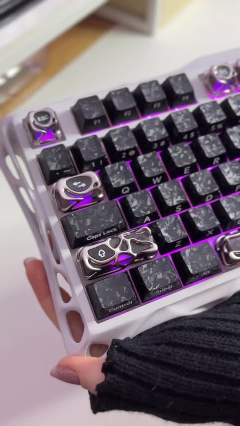Instagram post by an influencer for XVX Keyboard. Caption reads: [AD] Goth vibes keyboard 🖤 details in description....