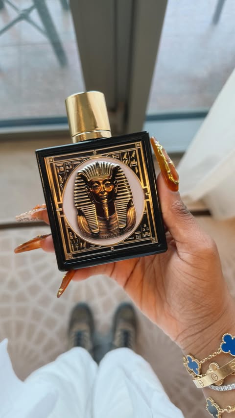 Instagram post by @funmimonet for Rayhaan Perfumes. Caption reads: 100 sprays of perfume sounds diabolical… but wait....