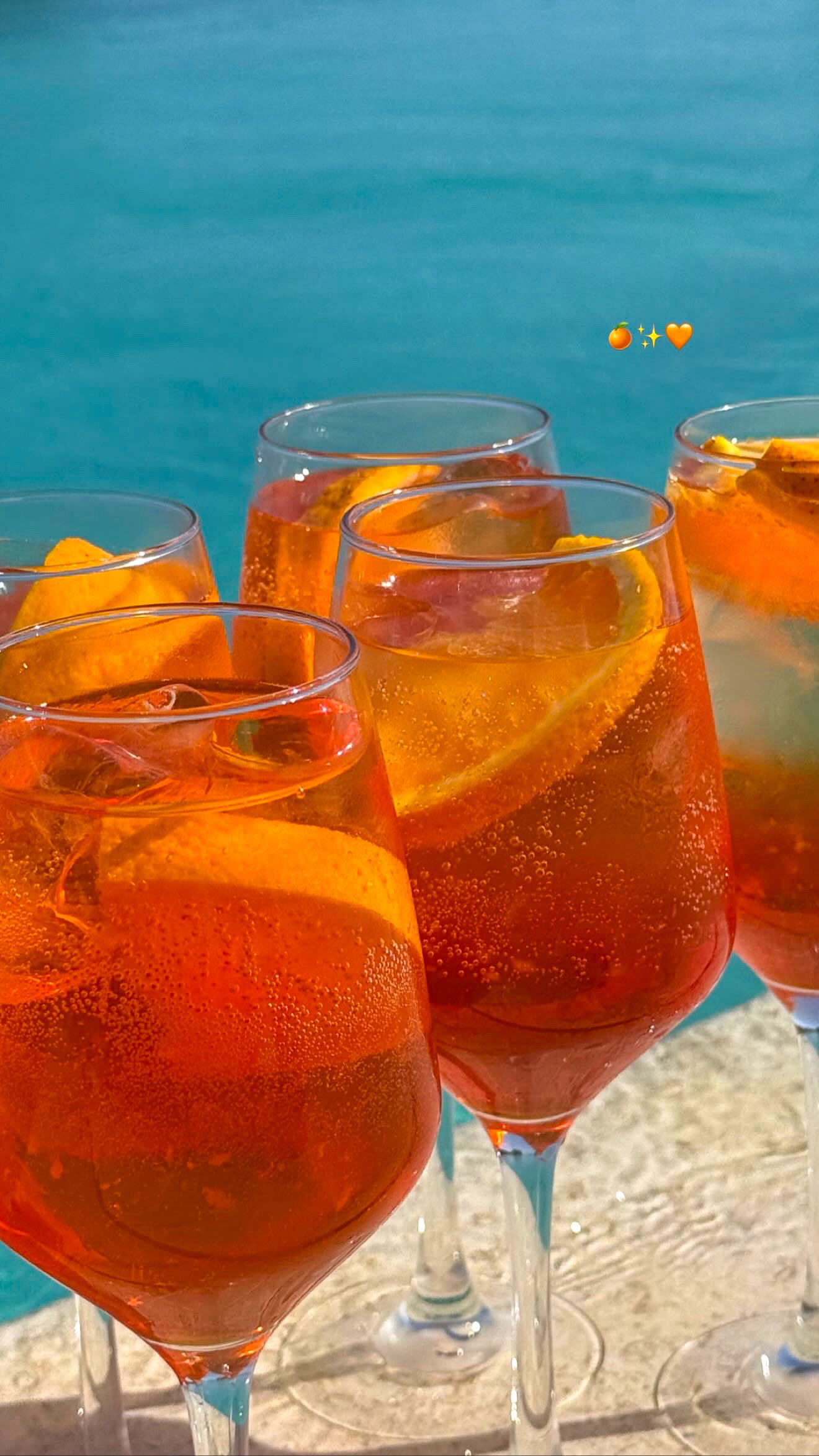 Instagram post by @champagneang for Aperol Spritz. Caption reads: You can’t do Euro summer without an Aperol Spritz.....