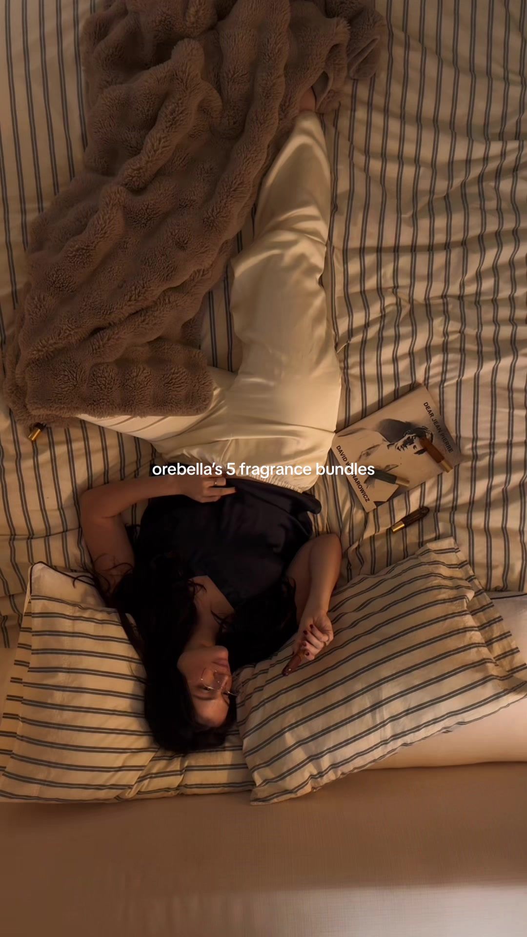 TikTok post by @layla.saad_ for Orebella. Caption reads: [...] fragrances and save 25% off on orebella.com.....