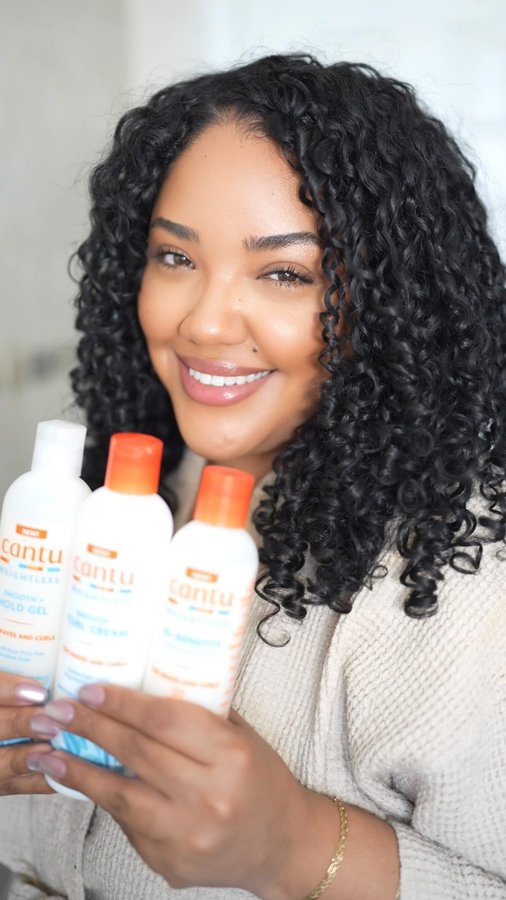 Instagram post by @beautymarkedilly for Cantu Beauty. Caption reads: The @cantubeauty Weightless Collection brought my....