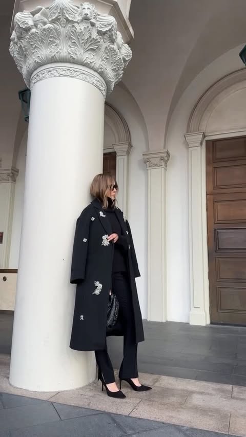 Instagram post by @lolariostyle for Saks Fifth Avenue. Caption reads: All-black but never boring🖤 Pants are also Cinq A....