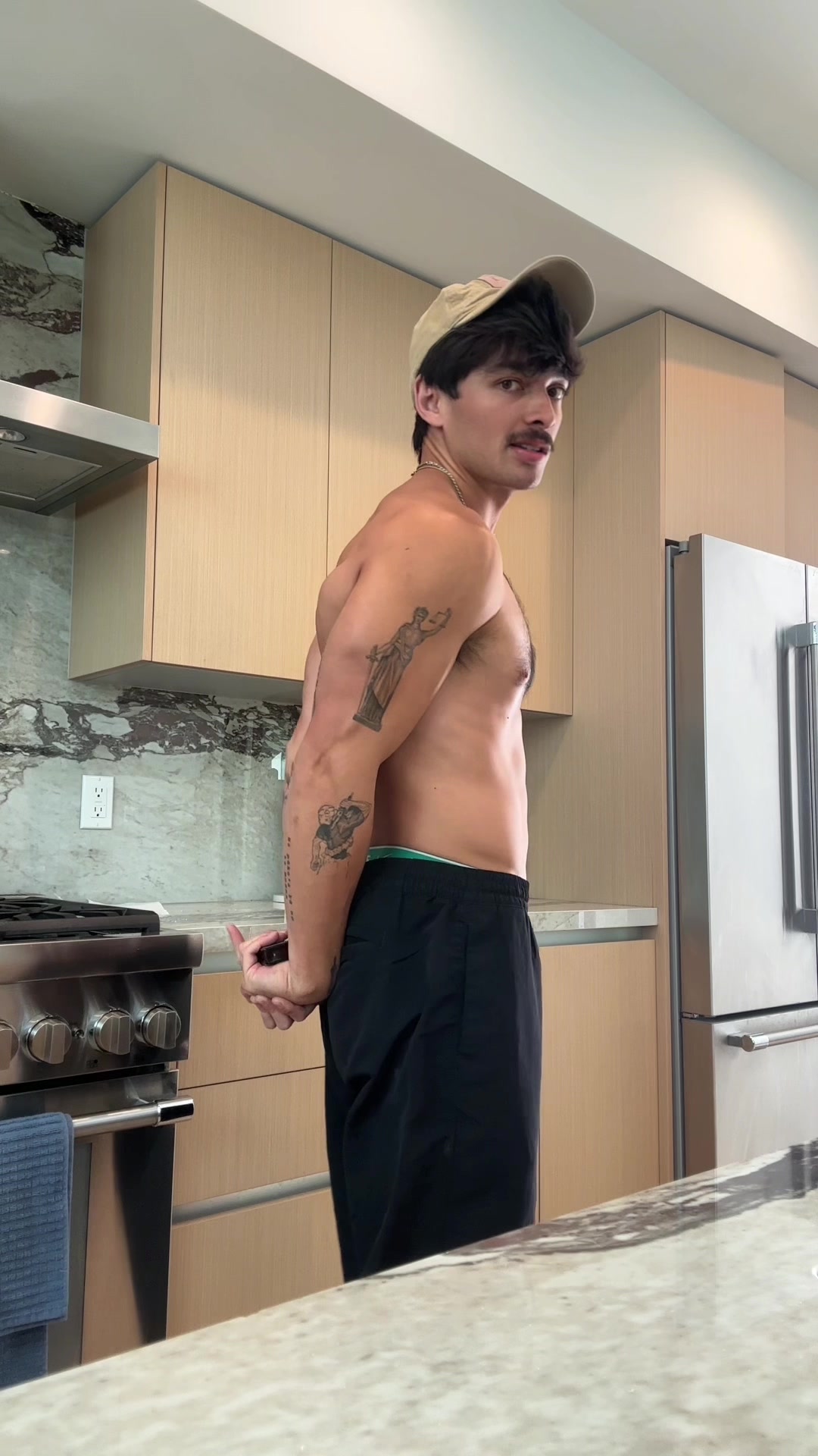 TikTok post by @emmettxhisoka for Chaddy Cosmetics. Caption reads: Now I understand why people tan before shows lmfao....