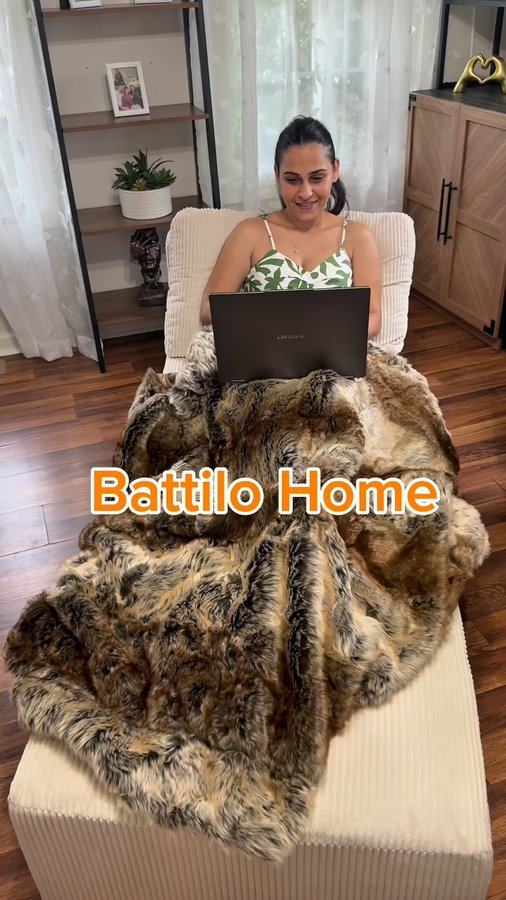 Instagram post by @america.timee for Battilo Home. Caption reads: ✨ Nothing says luxury like the Caitlyn Faux Fur....
