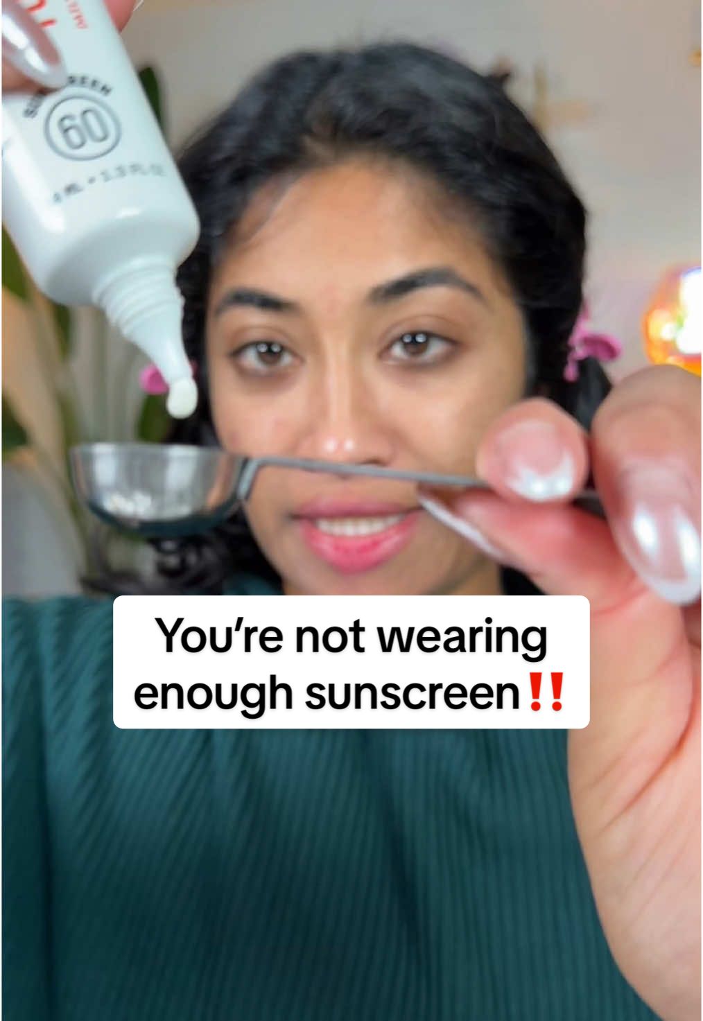 TikTok post by @monica.raviii for Youth To The People. Caption reads: MOST PEOPLE ARENT WEARING ENOUGH SUSCREEN‼️🤨 With....
