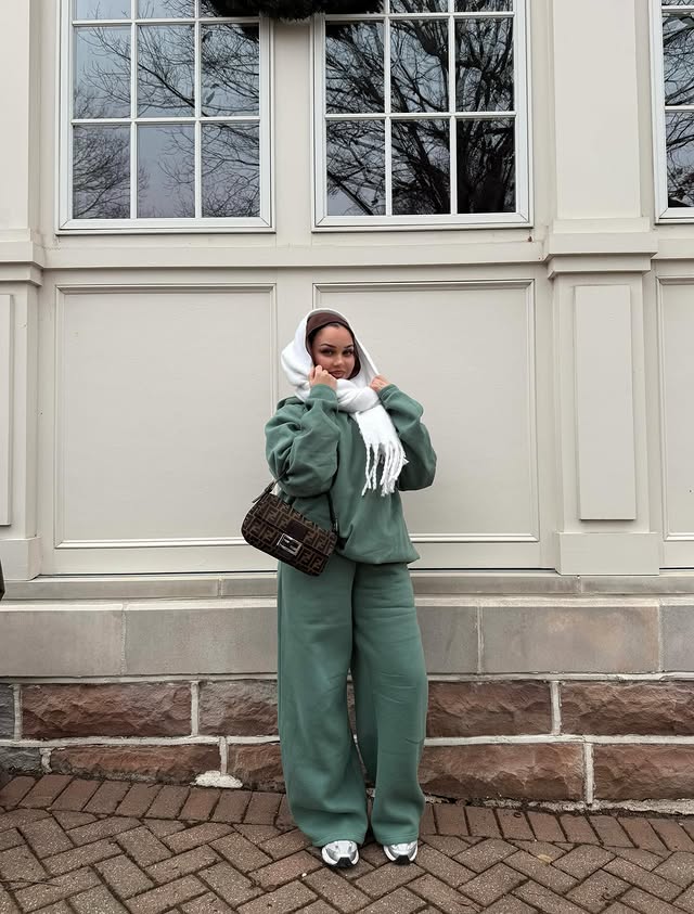 Instagram post by @briannagetsready for Veiled. Caption reads: cold toes, warm heart 🤎 @veiledcollection | ad*.