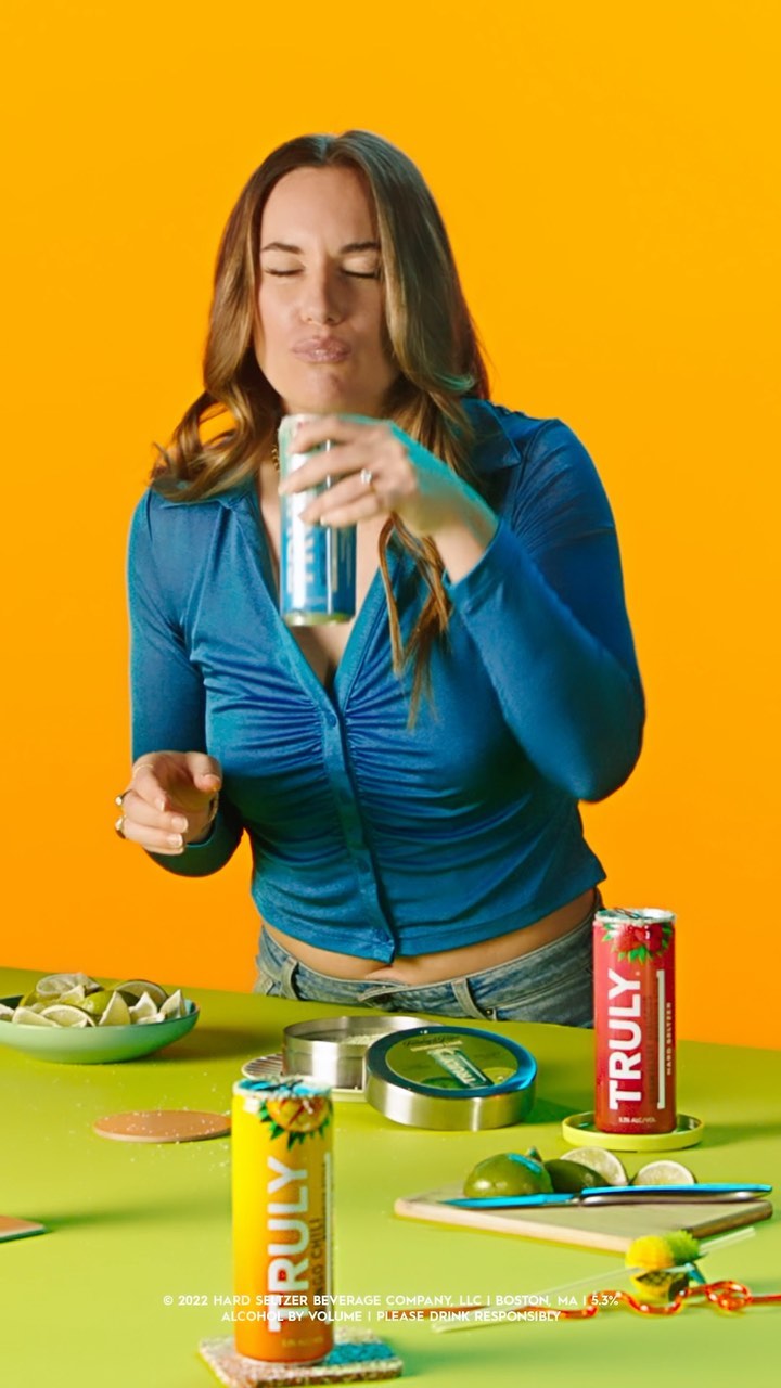Instagram post by @hannahberner for Truly Hard Seltzer. Caption reads: The perfect mix of salty (my ex) & sweet....