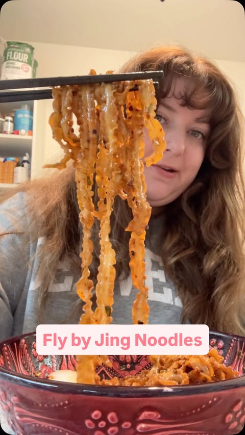 Instagram post by @babyhandsbakes for FLY BY JING. Caption reads: Use my code BABYHANDSBAKES on the fly by king....