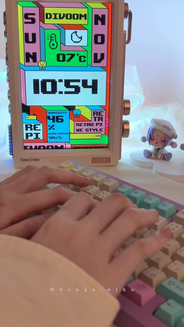 Instagram post by @dango.niko for Divoom. Caption reads: 👾 Divoom Times Frame • a nice addition to any....