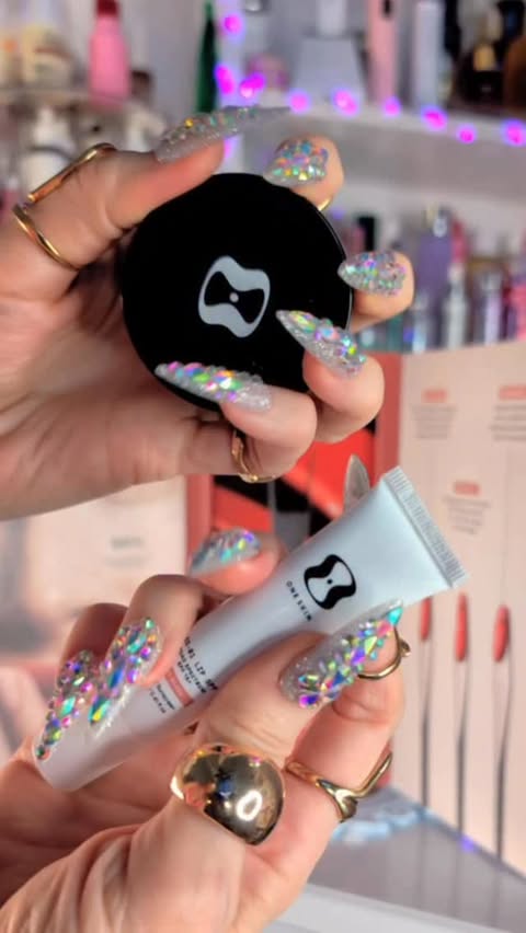 Instagram post by @katerinamiami108 for OneSkin. Caption reads: In love with this @oneskin.co lip duo! #oneskin....