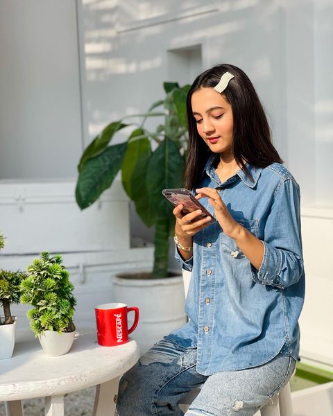 Instagram post by an influencer for NESCAFÉ Pakistan. Caption reads: Morning coffee is my favorite way of starting the....