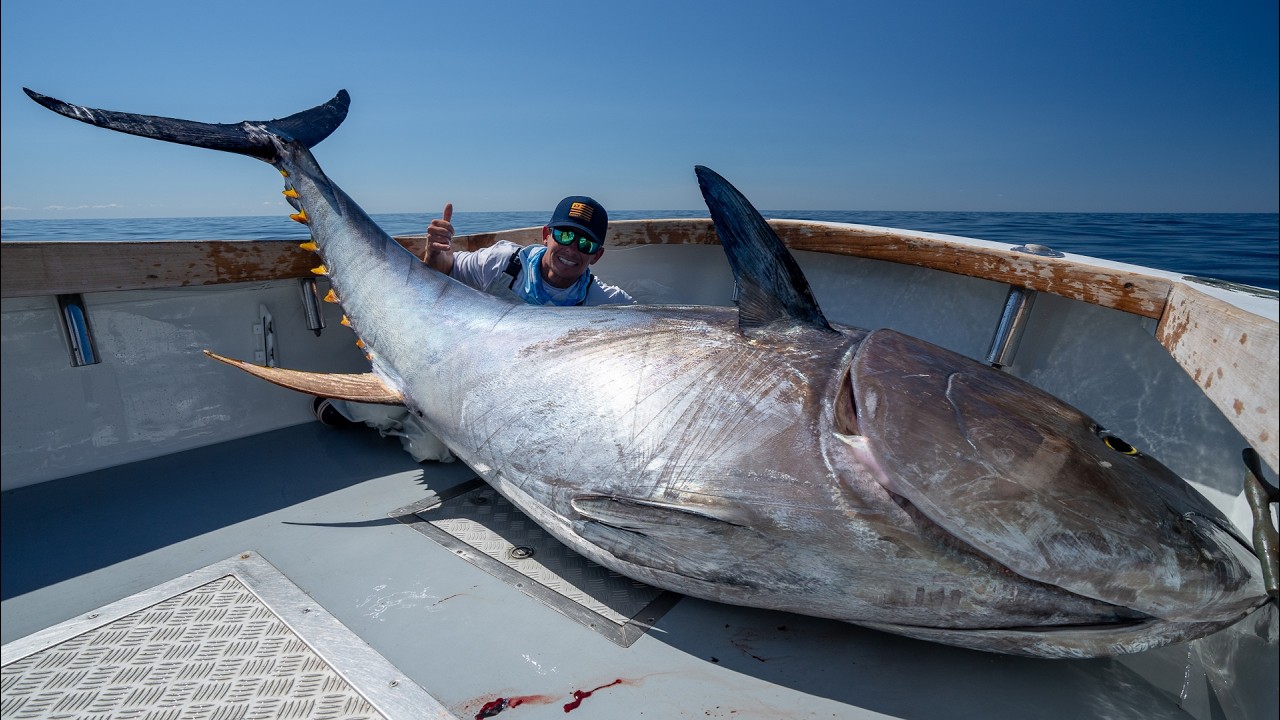 YouTube post by @LandsharkOutdoors for Garmin. Caption reads: 48 Hrs Chasing $1,000,000 Fish... GIANT Bluefin....