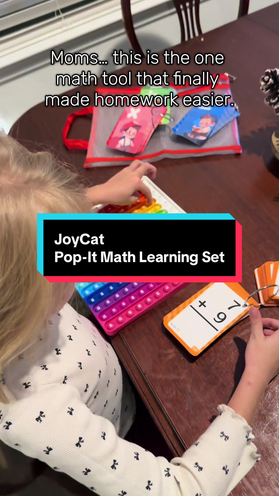 TikTok post by @brittabtoks for JoyCat. Caption reads: [...] or loses focus during homework, this JoyCat....