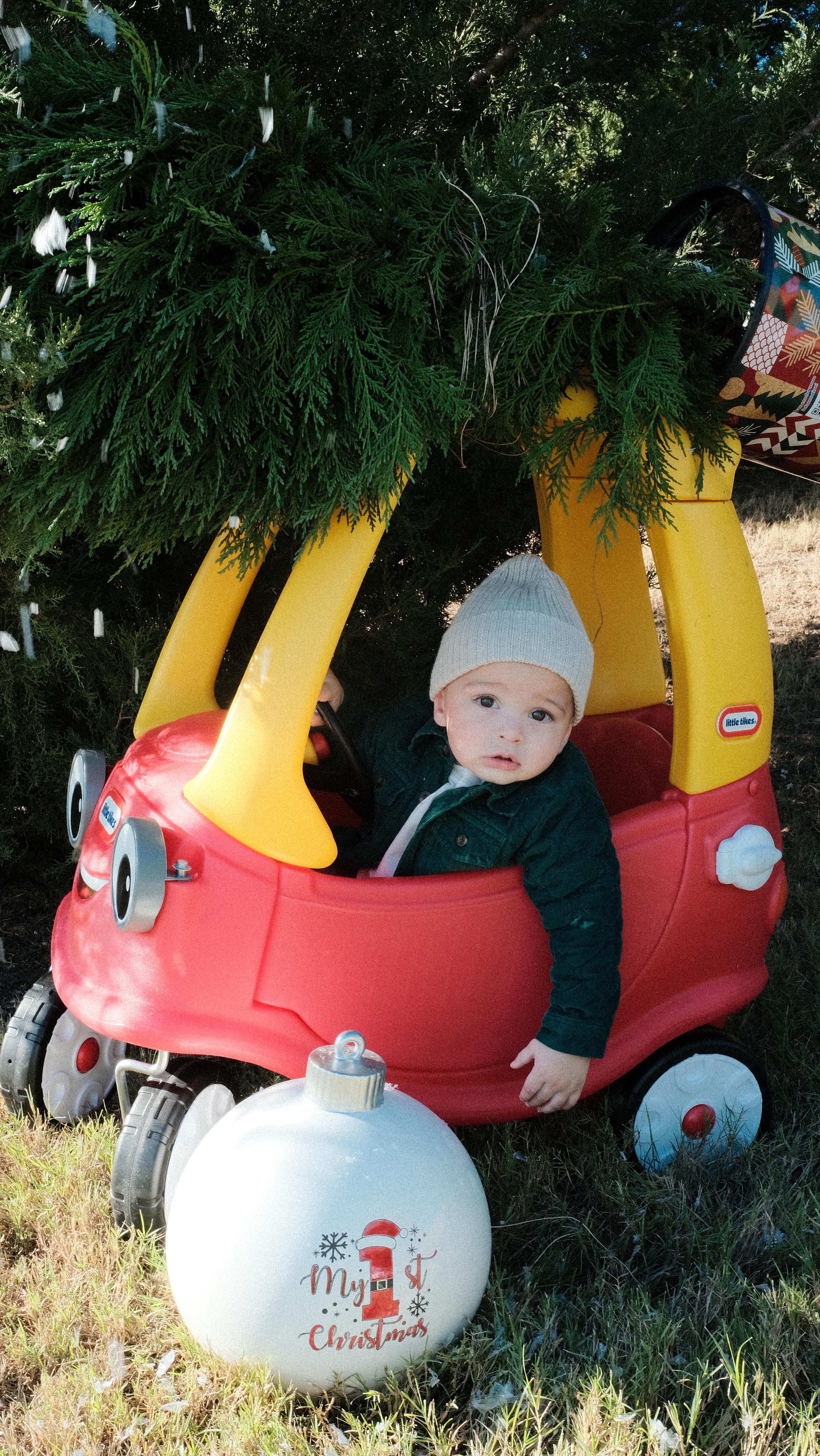 Instagram post by @alexissjohnsonn for Carter's. Caption reads: This is your sign to get a little red car + a tree....