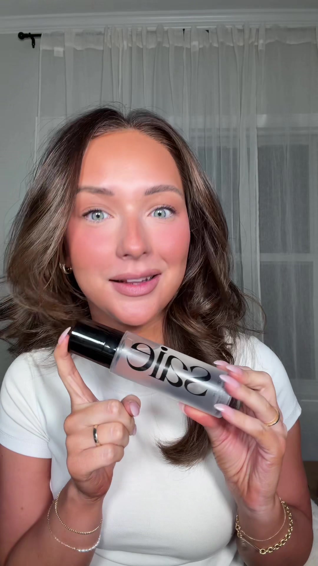 TikTok post by @shelbyannbell for Saie hello. Caption reads: We really put the new @Saie CitySet Lightweight....