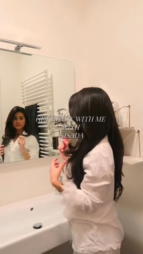 Instagram post by @dina_aitbibi for Gisada. Caption reads: [...] me for dinner smelling luxurious 🍸....