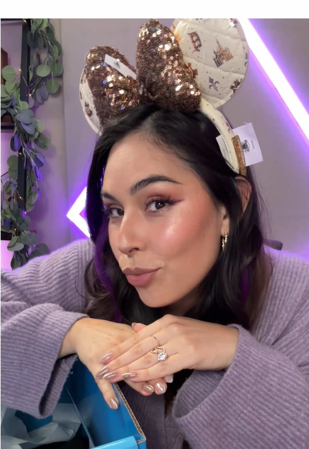 TikTok post by @cupquakely for Disney Store. Caption reads: [...] a child? 🤔  Thank you for the gifts @Disney....