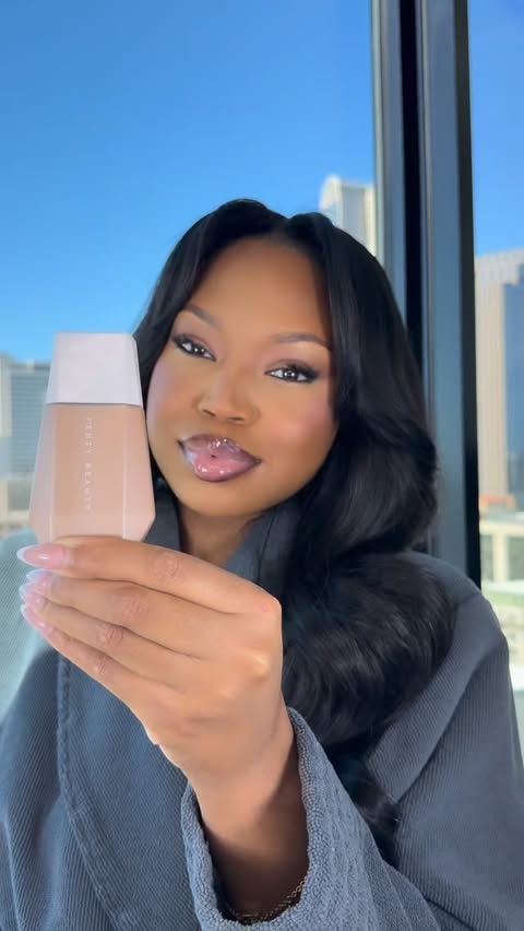 Instagram post by @officialericaam for FENTY BEAUTY BY RIHANNA. Caption reads: Girls... when a skin tint is actually giving....