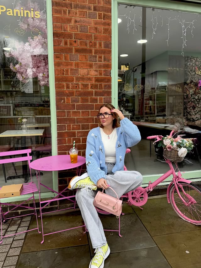 Instagram post by @mrsleonieholland for Blue Vanilla. Caption reads: Flower szn 🌸 Cardigan @bluevanillaofficial.