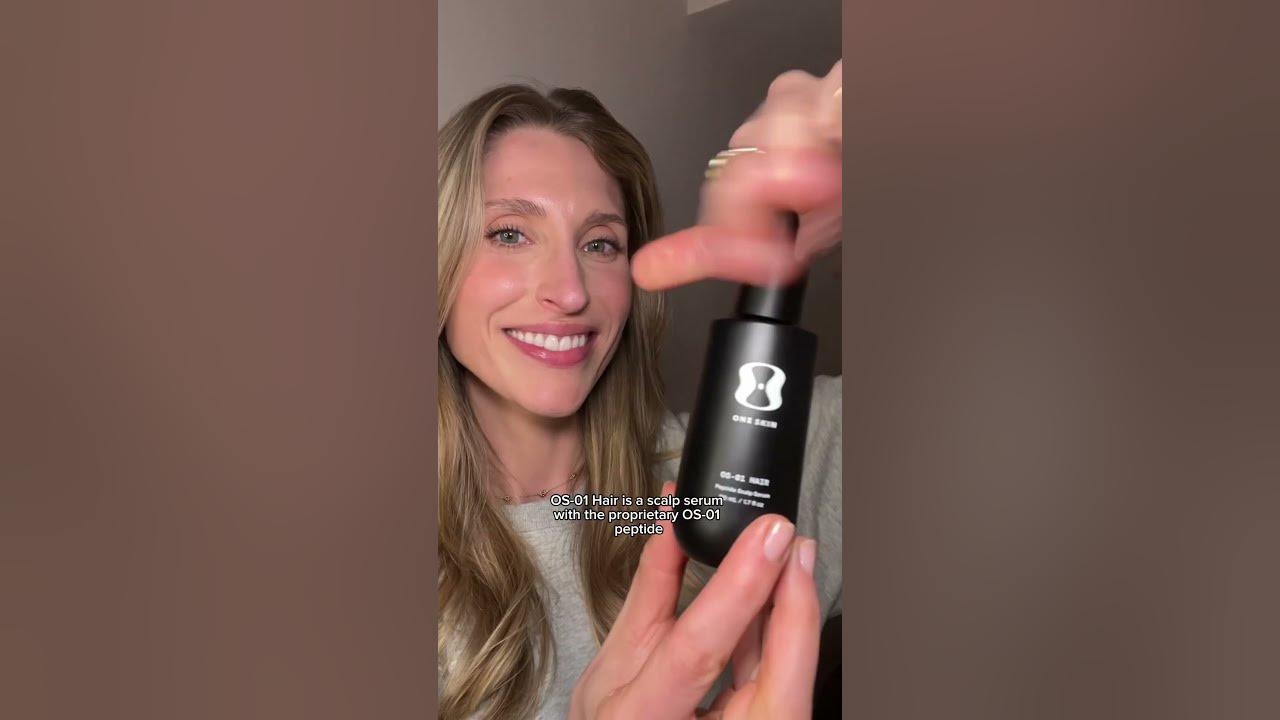 YouTube post by @DrSamEllis for OneSkin. Caption reads: [...] some love. I’ve been using the new....