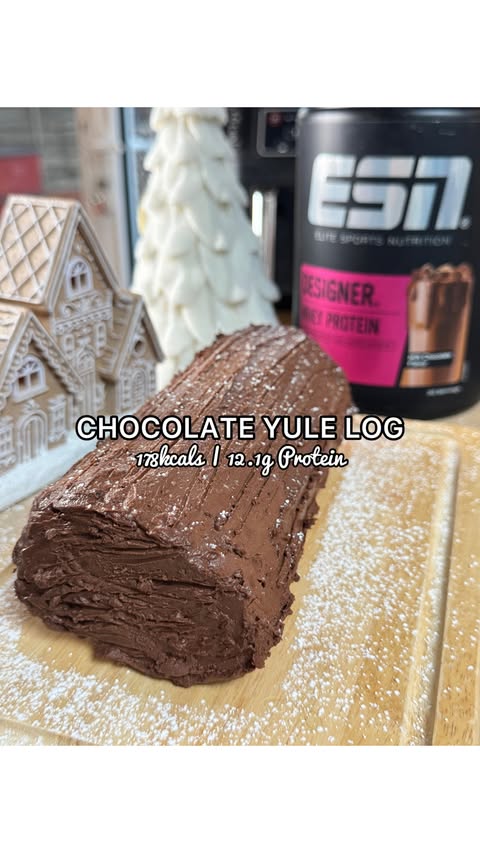 Instagram post by @jessiemay_foodiefitness for Esn. Caption reads: 📌 🍫 HIGH PROTEIN CHOCOLATE YULE LOG | 12.1g....